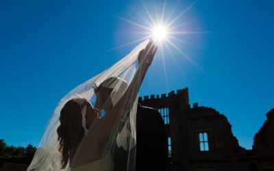 Bride and groom silhouette at Cowdray Manor, West Sussex