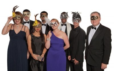 Group photo at Masked Ball for Institute of Hospitality London Branch