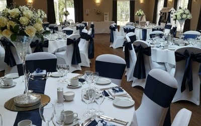  A range of chair covers and sashes for hire, including setup and collection. Centerpieces also available for hire in silk or fresh arrangements. 