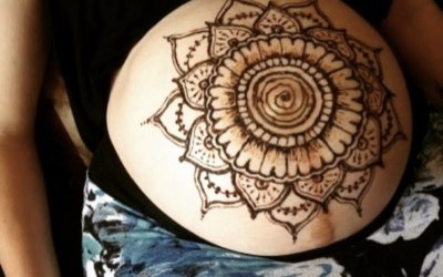 Prenatal maternity artwork in henna or paint