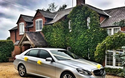 Aura Wedding Cars Mercedes Benz E Class on Wedding duties all dressed in Lemon ribbons and bows