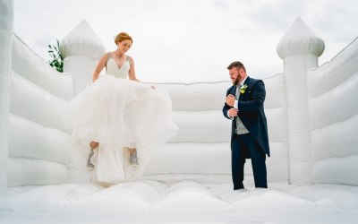 Our Hire able White Wedding Bouncy Castle.