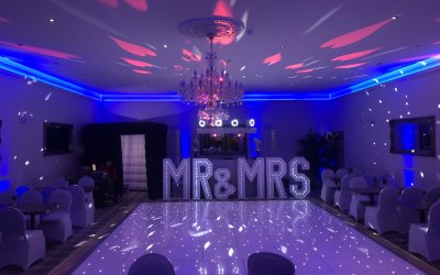 My New all white disco with giant letters, white led dance floor and photo booth.