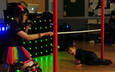 Kids love the limbo! Definately the most popular kids party game :) 
