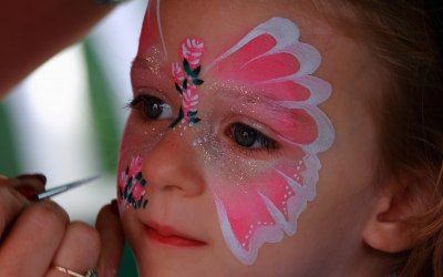 Face painting is a popular activity for all ages.