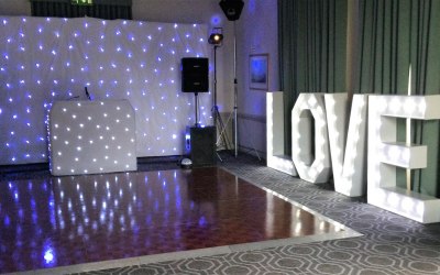 With illuminated 'LOVE' letters