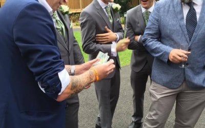 Adam Smith performing magic at a wedding in Leicster