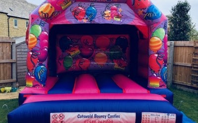 purple and pink bouncy castle