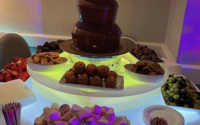 4 tier chocolate fountain served with fresh fruit & dipping treats 