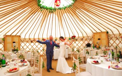 A newly married couple in the 8m yurt. Seats up to 50 people