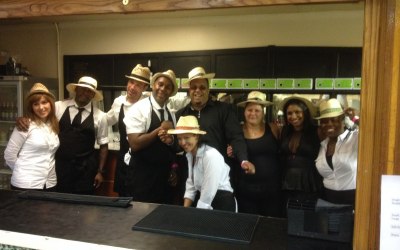 Bar team after a fun night serving tasty drinks for a concert in Camden Town Hall