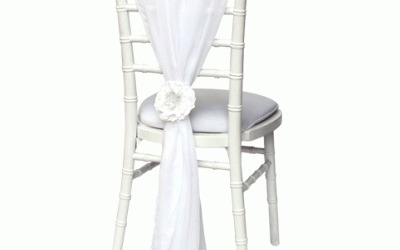 White chiffon vertical drop sash with artificial flower embelishment