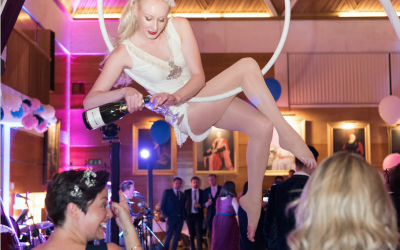 Aerialist Pouring Champagne 