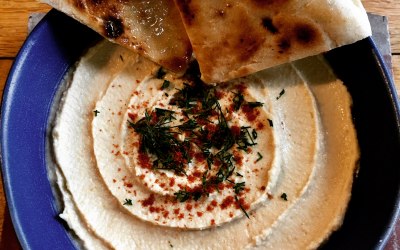 Our own-made hummus with grilled pita