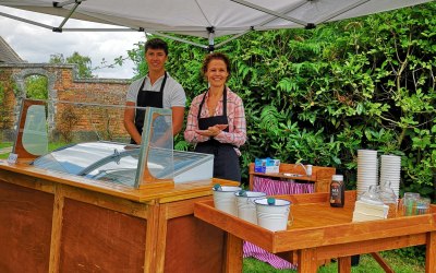 Large ice cream stall providing luxury soft ice cream available for wedding and events. 