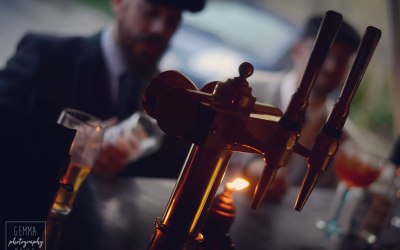 Solid brass draught taps serving premium cider, wheat beer and lager