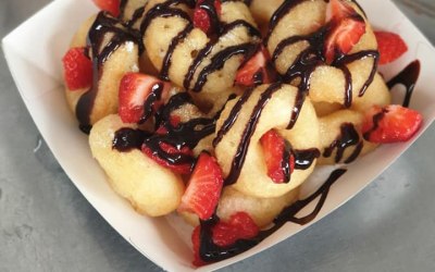 Donuts with Fresh Strawberries and Chocolate Sauce