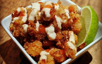 Cajun Crayfish Popcorn topped with Louisiana remoulade and cayenne pepper sauce