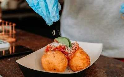 The finishing touches to the crab arancini