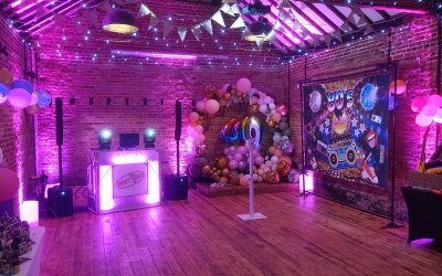 40th Birthday at The Elm Tree, Ringwood. Party DJ & 80s Themed Photo Booth Package with live Saxophone artist. 2 moving heads and 8 uplighters used to light up the dancefloor area and back wall.