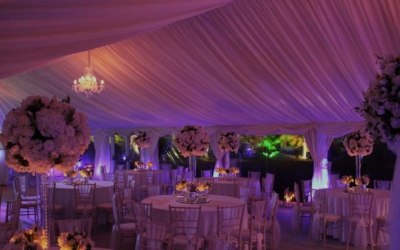 Marquee linings with uplighters, chandeliers and panoramic windows.