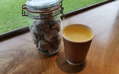 our own blend organic turmeric latte with some chocolate treats