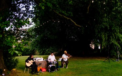 Playing our hearts out under an old oak tree.