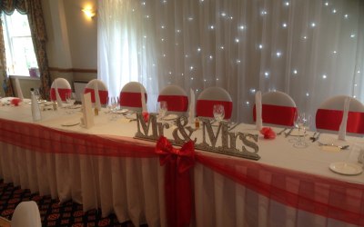 Top Table and Backdrop Razzmatazz Occasions