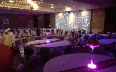 Table Decoration and Backdrop Razzmatazz Occasions