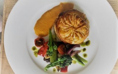 Grilled provencal vegetable and buffalo mozzarella pithivier with basil oil and roasted red pepper soubise