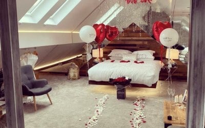 Marriage proposal hotel room set up