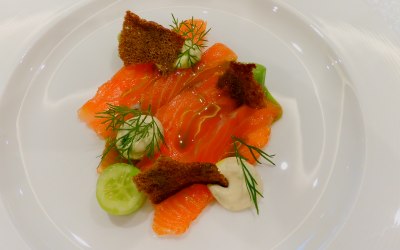 24 hours gin cured salmon, compressed baby cucumbers, lime cream cheese, crispy rye bread and dill