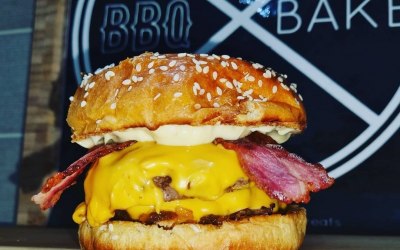 The DJ Ironman burger - Double pattie, smoked bacon, American cheese and Hennessy Bacon jam on a seeded brioche bun 