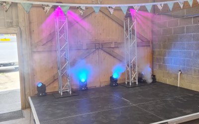 Staging and Lighting provided for a live music rock and roll show for a wedding 