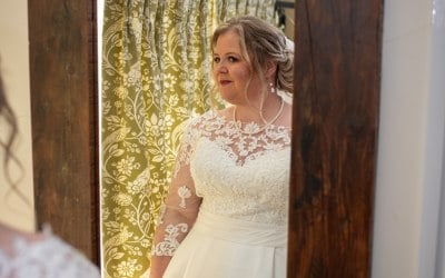 Bride looking in the mirror