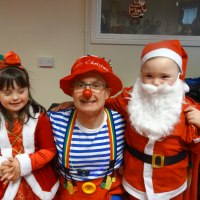 Mr Custard with the santa's helpers Bluenose Entertainments