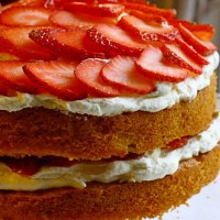 Kate Bullock's large cake with strawberries on the top