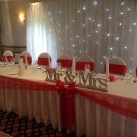 Our decor at Houstoun House Uphall Top Table and Backdrop Razzmatazz Occasions
