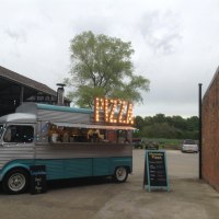 Pizza catering for an evening wedding Vintage van providing wood fired pizza for weddings