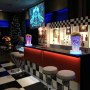 We setup a 10ft american dinner themed bar for a corporate function and supplied waitress and flair bartenders to serve shakes and cocktails to guests Themed Bar Hire