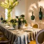 Our Chandelle white/gold chairs used to create an elegant spring design