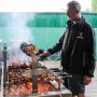 Head Chef Marcus hard at work on the grill! Head Chef Marcus hard at work on the grill!