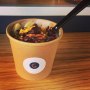 oatmeal with goji berries pecans cranberries and bee pollen