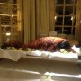 Whole roasted hog displayed on a table as a centre piece