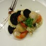 Scallop and black pudding risotto, finished with micro basil and a balsamic glaze Scallop and black pudding risotto, finished with micro basil and a balsamic glaze