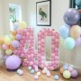 40th 4ft Numbers Filled with Balloons with a side garland and a set of 7. 40th 4ft Numbers Filled with Balloons with a side garland and a set of 7.