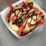 Donuts with Fresh Strawberries and Chocolate Sauce Donuts with Fresh Strawberries and Chocolate Sauce