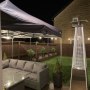 Gazebo, heater and festoon in garden party Gazebo, heater and festoon in garden party