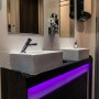 Modern spot lighting & large mirrors behind vanity area Modern spot lighting & large mirrors behind vanity area