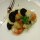 Scallop and black pudding risotto, finished with micro basil and a balsamic glaze Scallop and black pudding risotto, finished with micro basil and a balsamic glaze